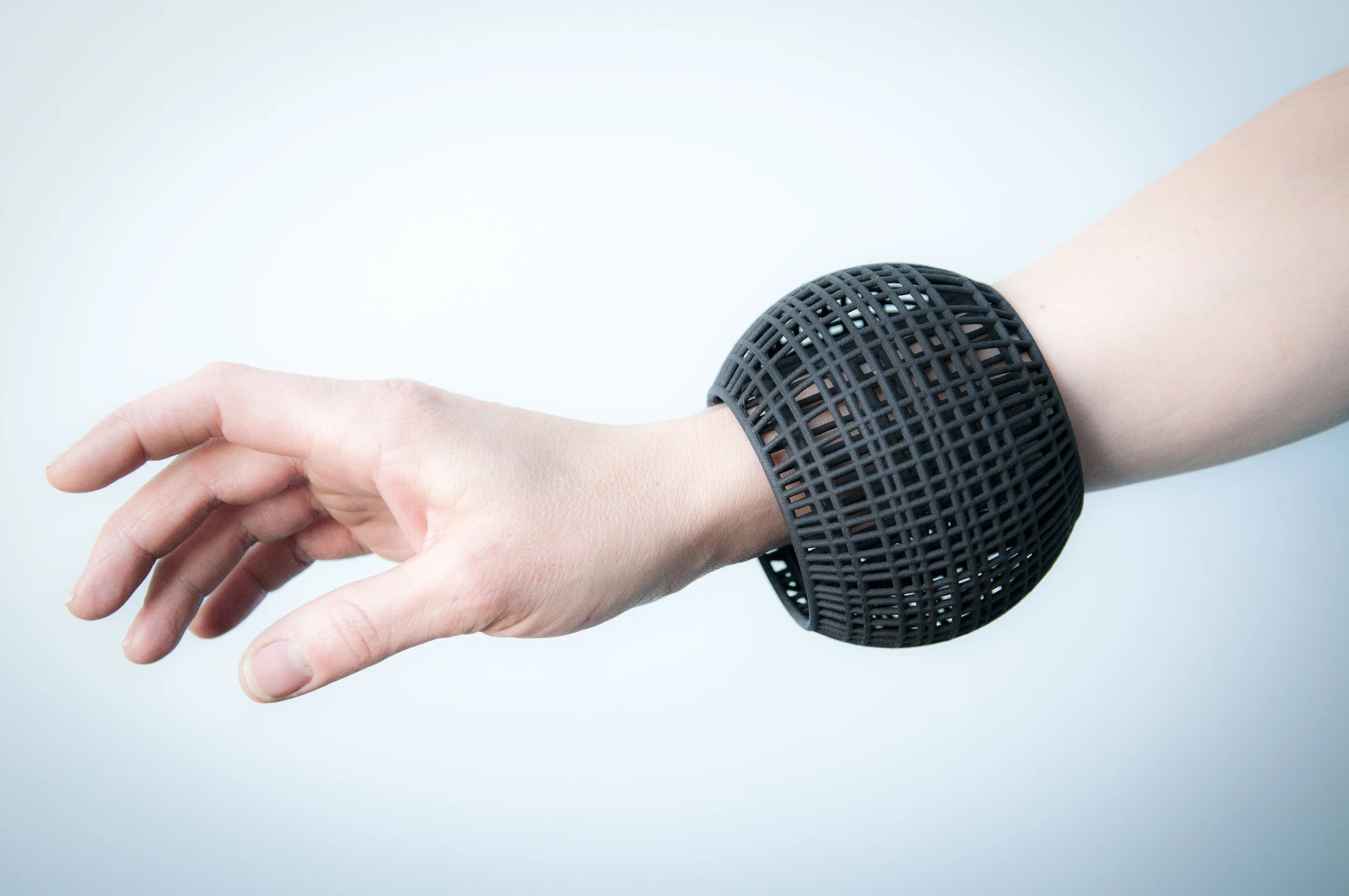 Cage Bangle Black-Model-Small.jpeg