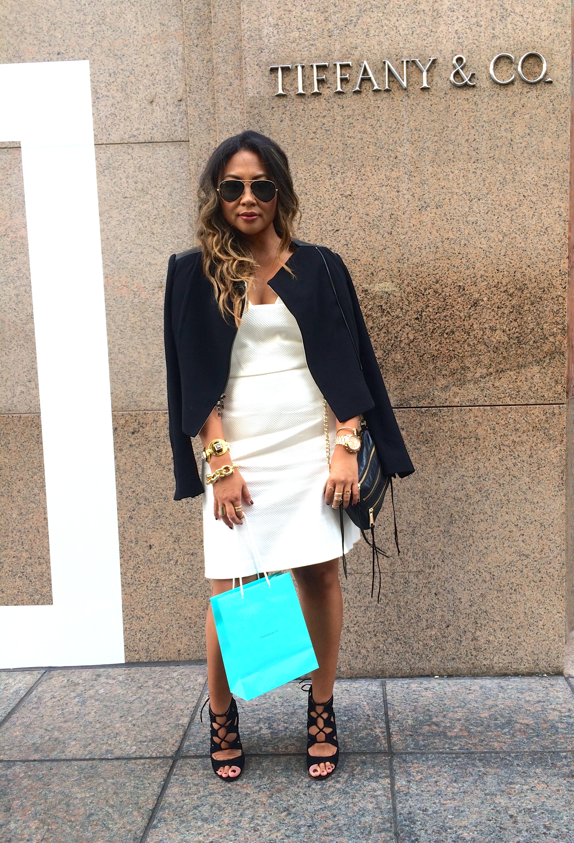 WHITE + BLACK "White with Black" is a personal favorite combo. Done the right way, it can make a statement while being the perfect chic look for a power work day. Adding personal gold touches on your arm stack or ring party is an easy way to add a layer of personal style. __________________________________________________________ Dress + Jacket : Rachel Roy Bag: Rebecca Minkoff Shoes: Dolce Vita Specs: Raybans Bracelets: J. Crew Watch: Micheal Kors