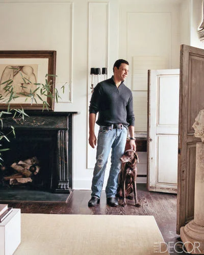 Interior Designer Darryl Carter with his dog Otis.