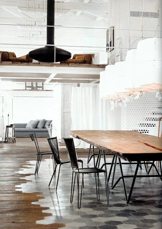 Timber floor meets tiles. Love the contrast.