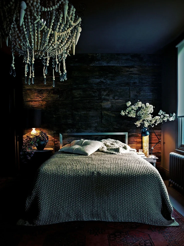 You may recognise this image from one of my older blog posts, but every time I see it I love it even more! This is the stunning bedroom of Interior Designer Abigail Ahern. Layered with gorgeous throws, cushions, flowers and THAT chandelier, not to mention the timber feature wall this room is everything I love about the design style of Abigail Ahern. 