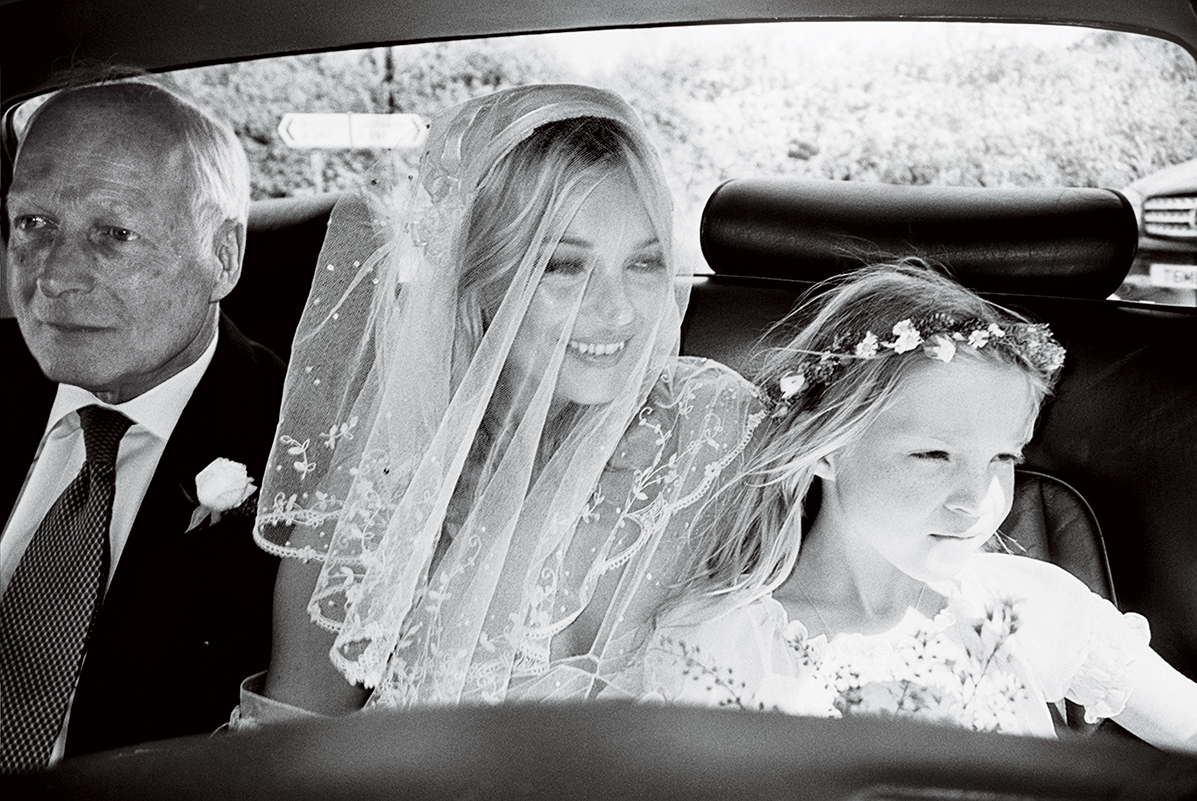 Father of the bride Peter Moss with Kate and her daughter, Lila Grace.