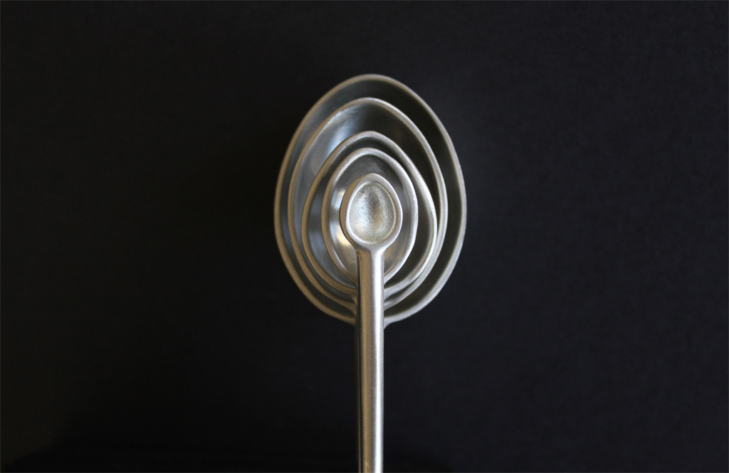 The spoons’ natural, non-concentric forms subtly underscore their pre-industrial origins.