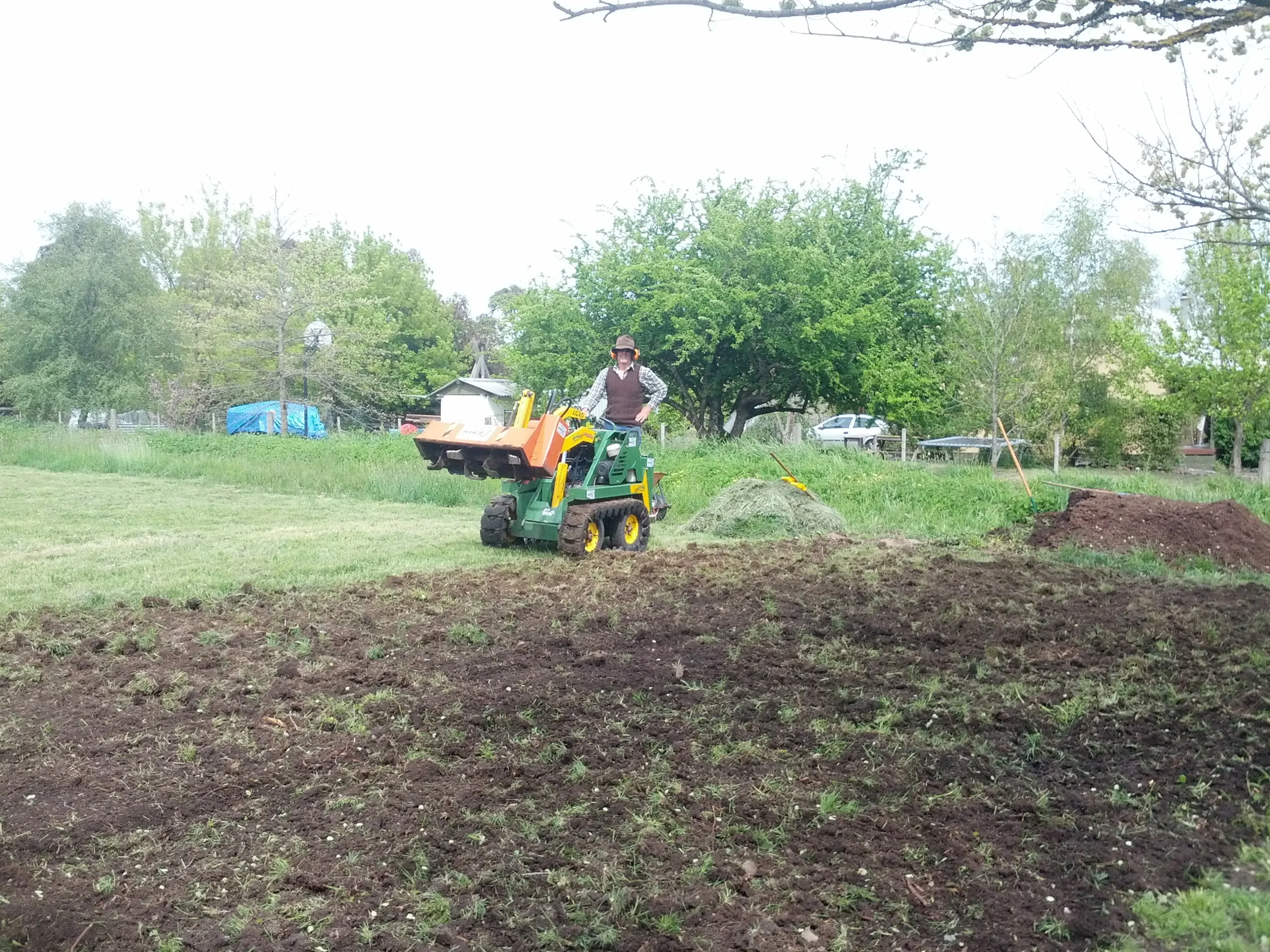 Steve and the rotary hoe.jpg