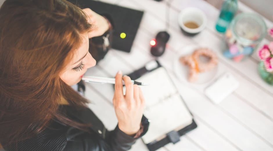 woman-hand-desk-office.jpg