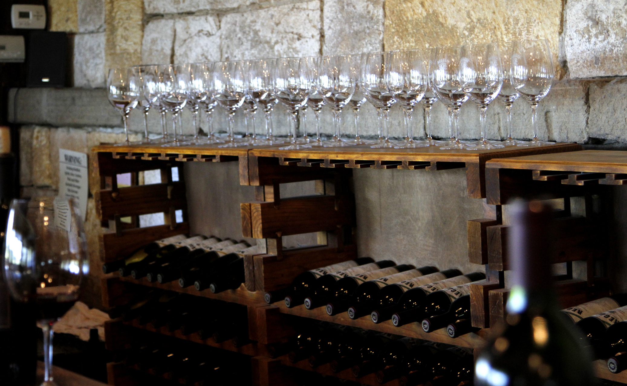 All the beautiful wine ducks, lined up in a row.