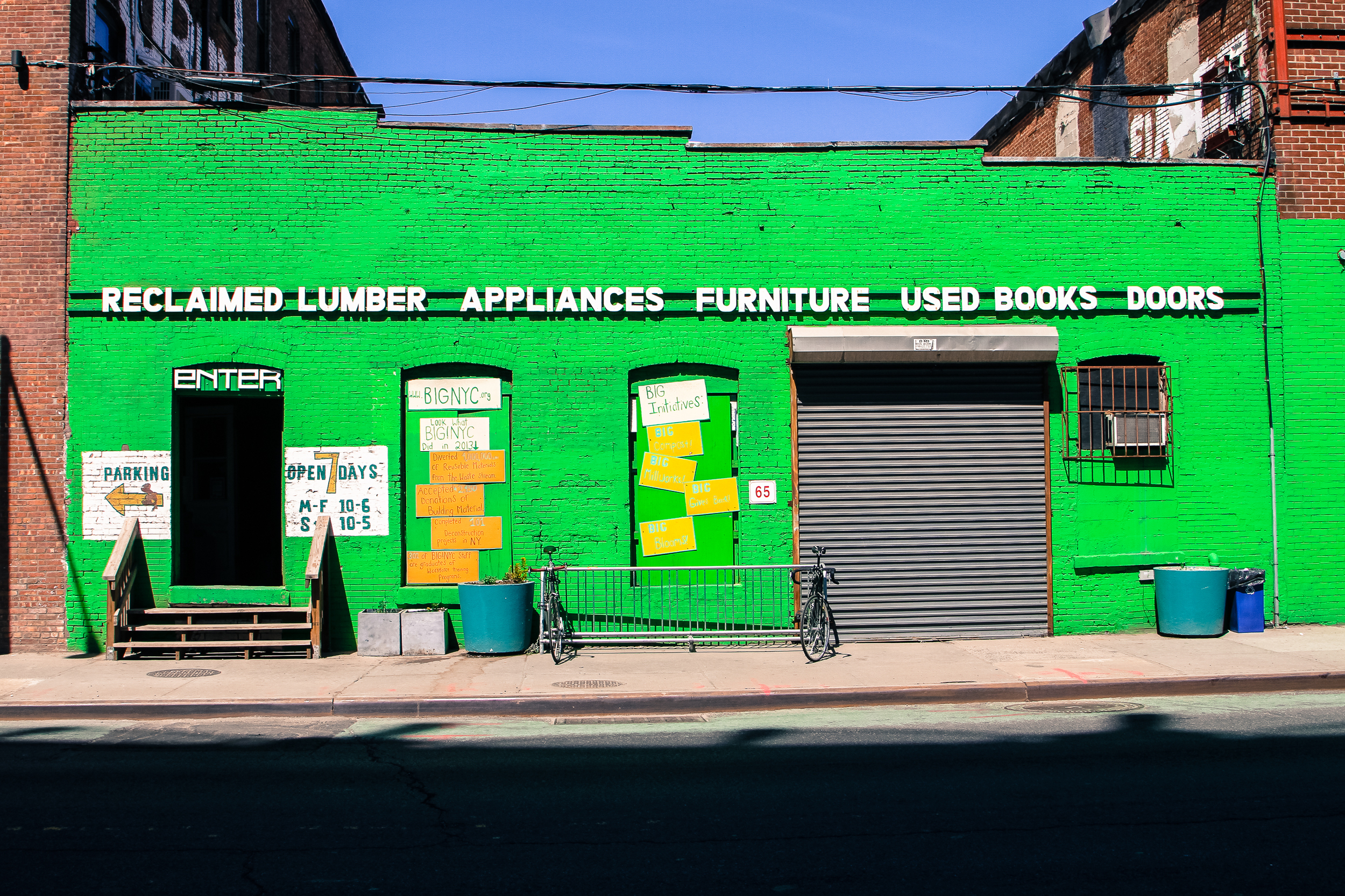 This bright green storefront definitely catches your attention on the street. Also the fact that they sell used books along with reclaimed lumber.