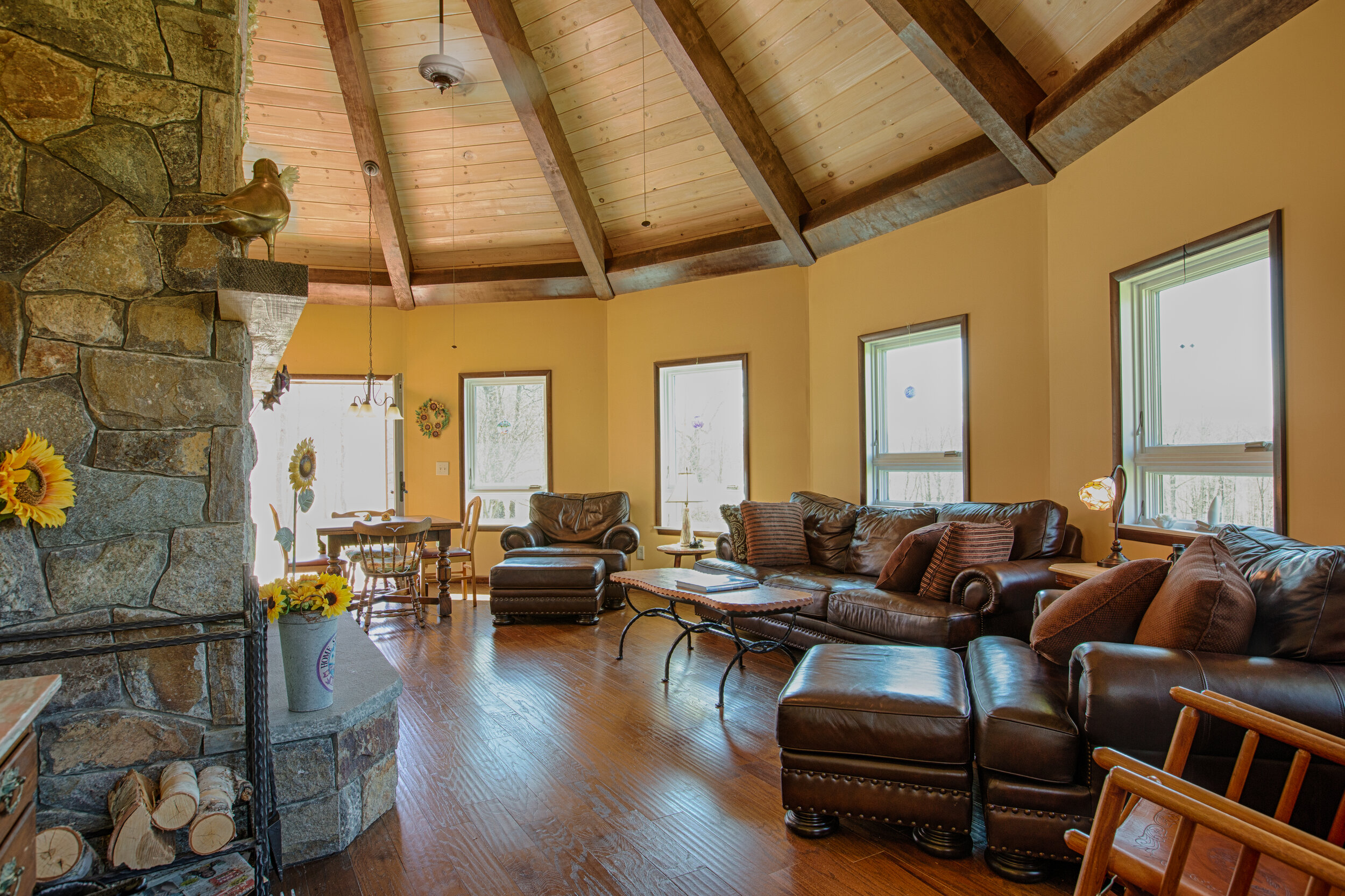 spacious living room facing the fireplace