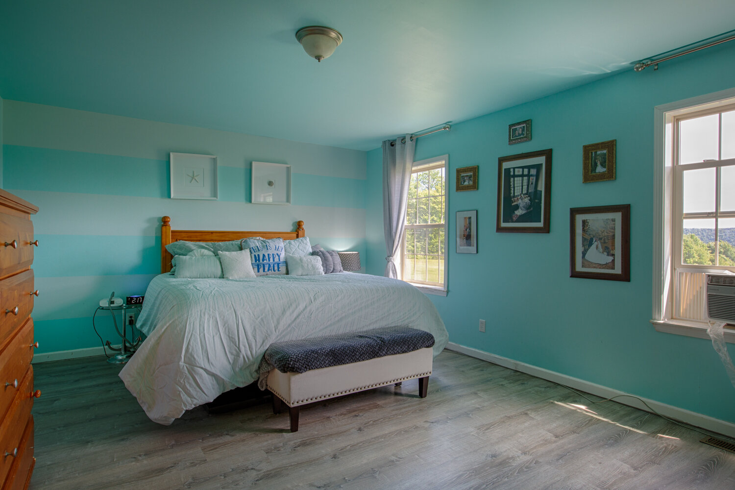 bedroom in aqua themed walls