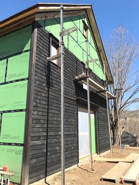 Hade Hollow - barn sheathing step 3 in process.jpg