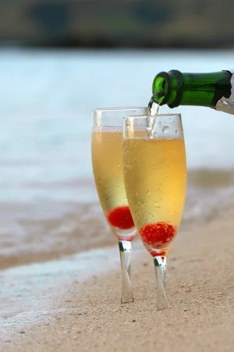 Champagne being served at the private beach