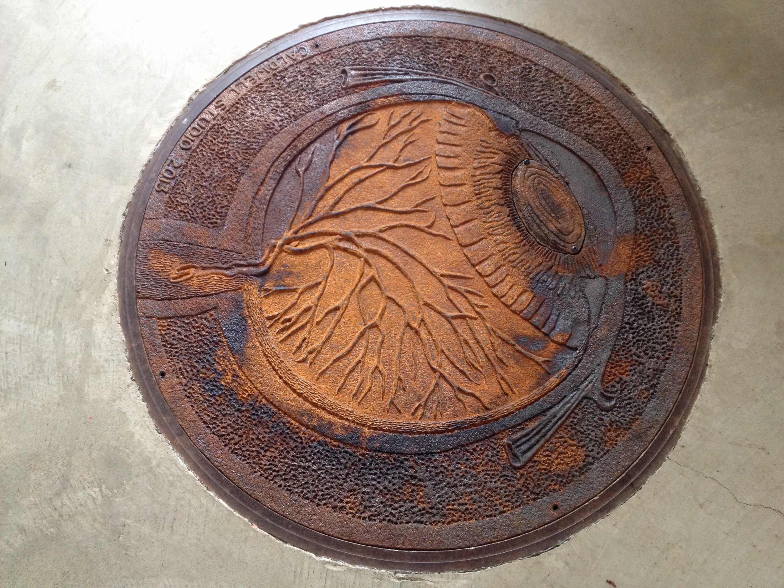 Unique 48" diameter cast iron manhole cover