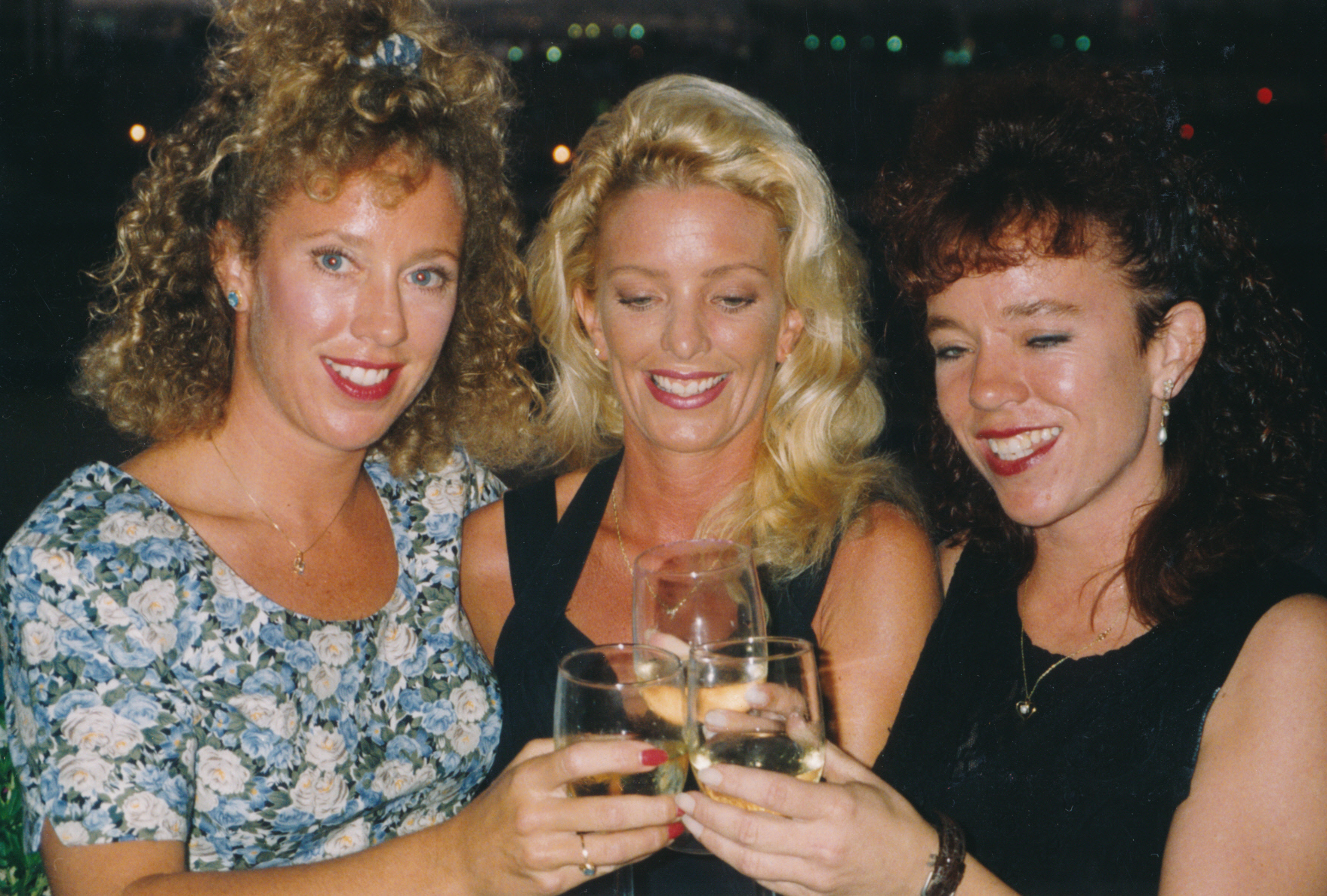At a club dancing with my sisters Chrissy & Jacque. 