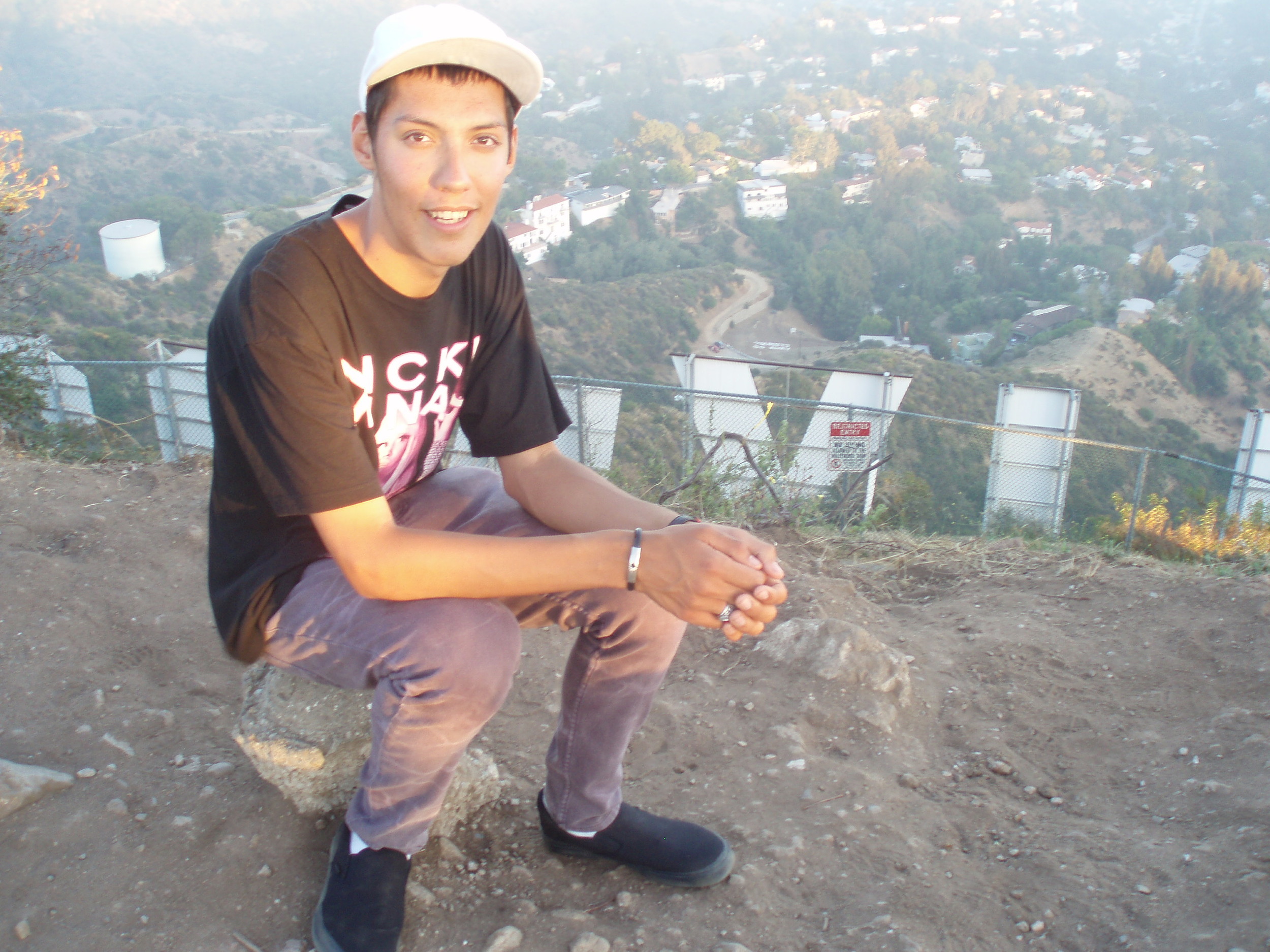 Cesar Martin Sanchez above Hollywood sign