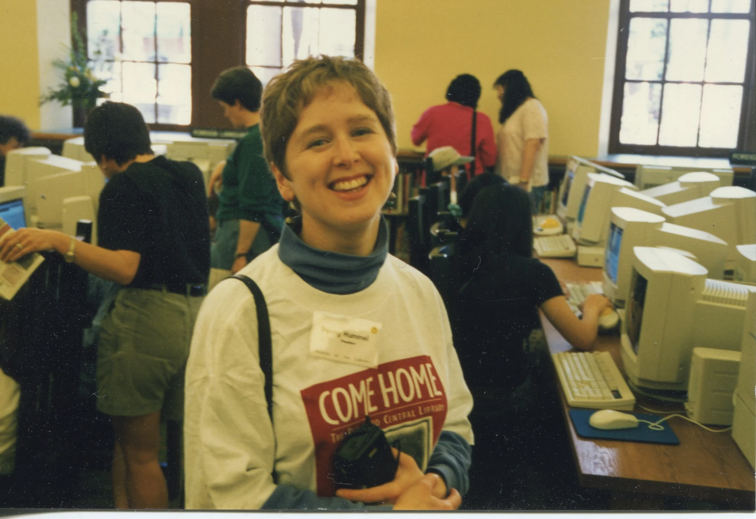 1997. Avid library lover "comes home" to Central Library at its triumphant reopening. 