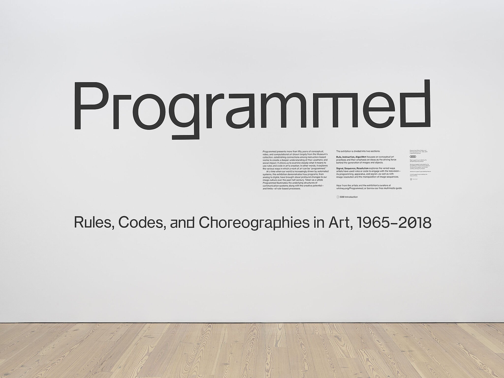 Wall text of the Whitney Museum's Programmed exhibit, set in customized Neue Haas Grotesk.