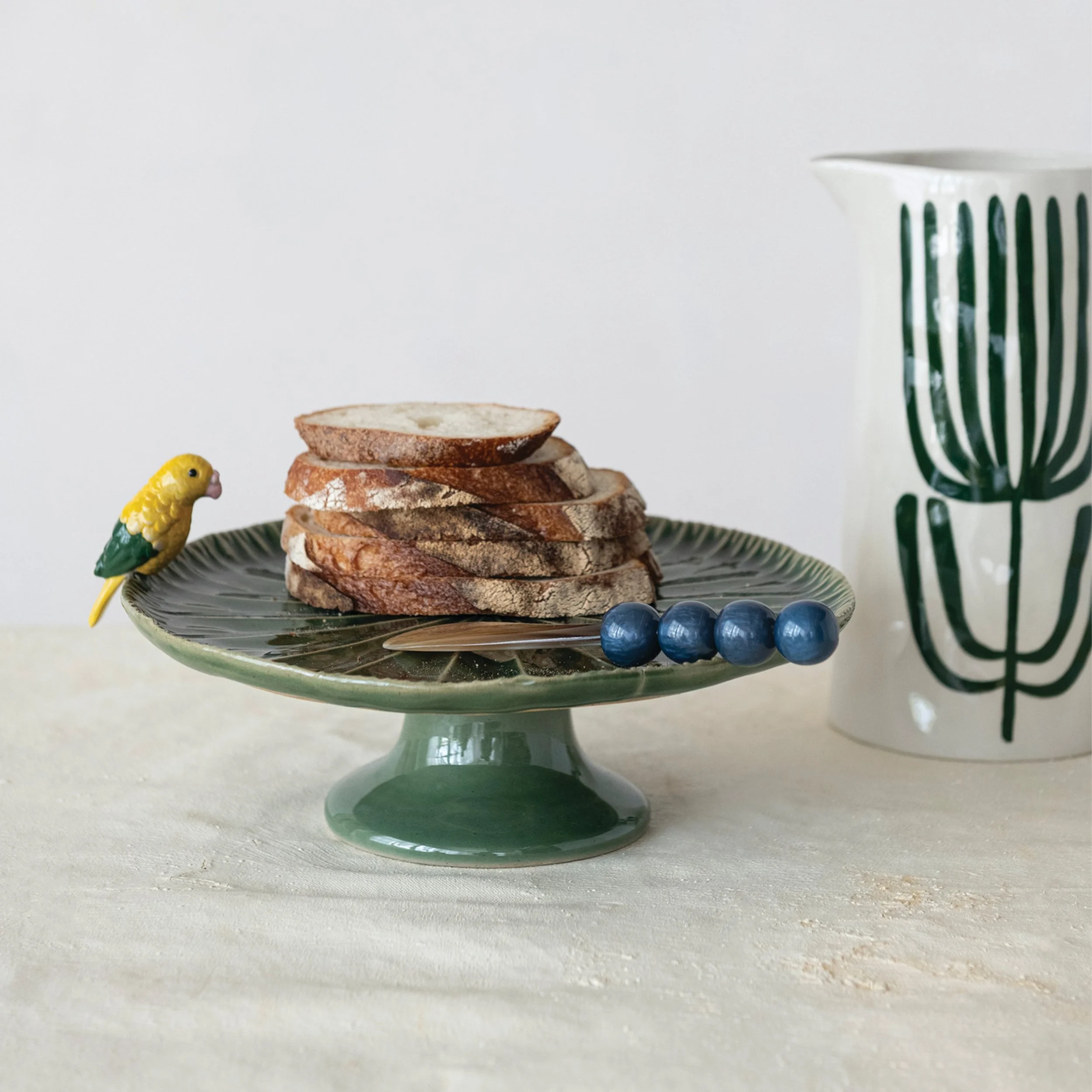 Green Stoneware Pedestal with Bird