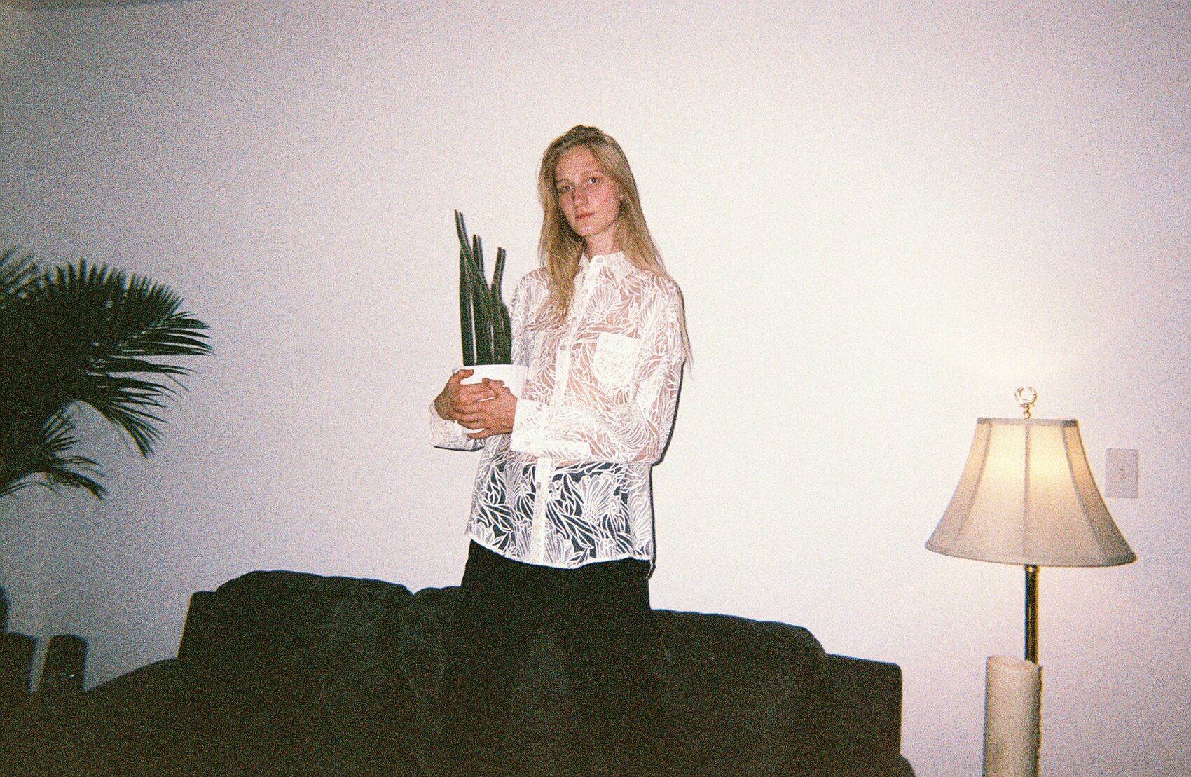   charlotte with cactus . williamsburg, nyc. 2016. 