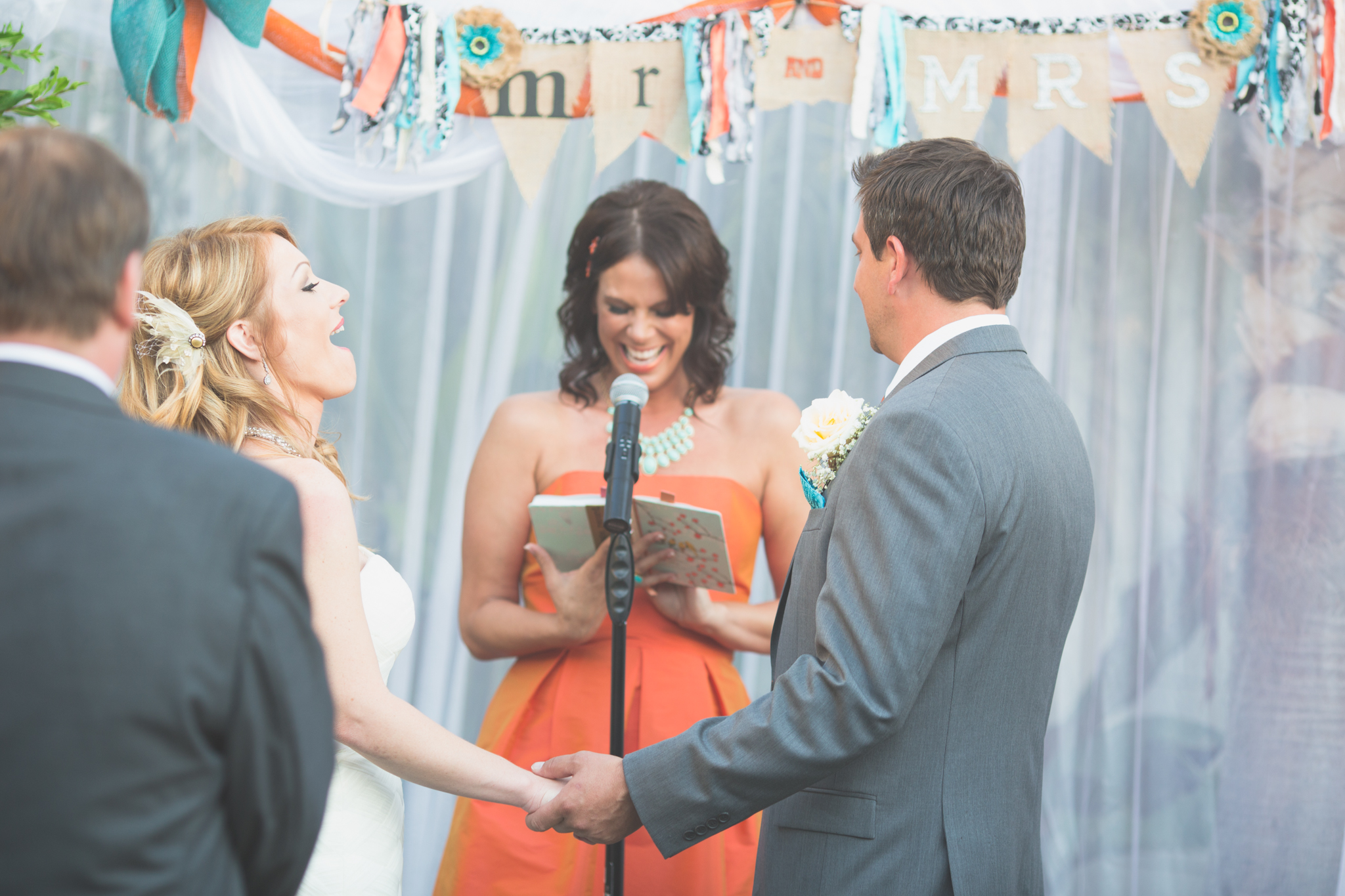 scottsdale-wedding-photographer-bride-laughing-ceremony-el-dorado