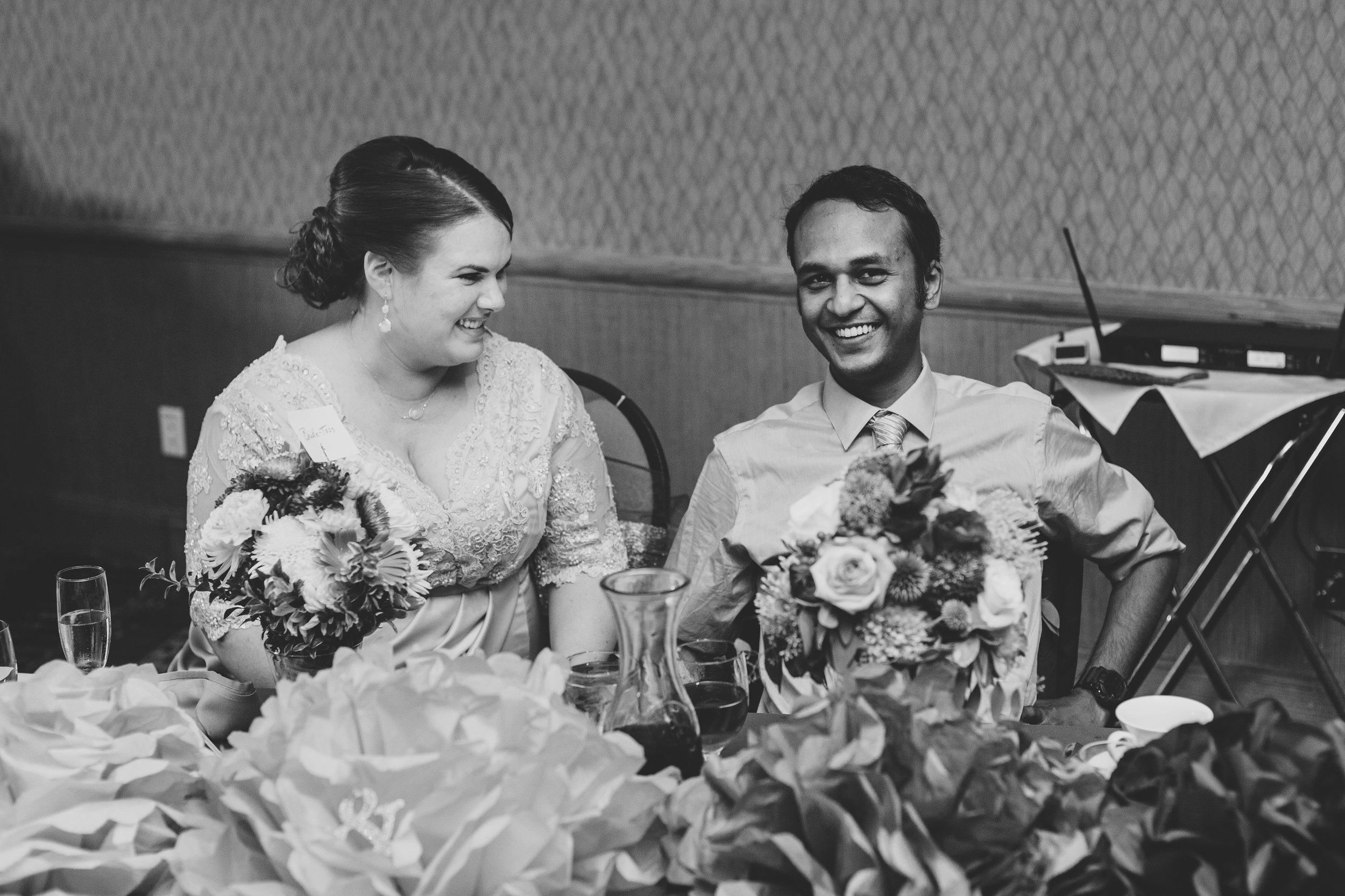 jessica-karthik-bride-and-groom-laughing-reception