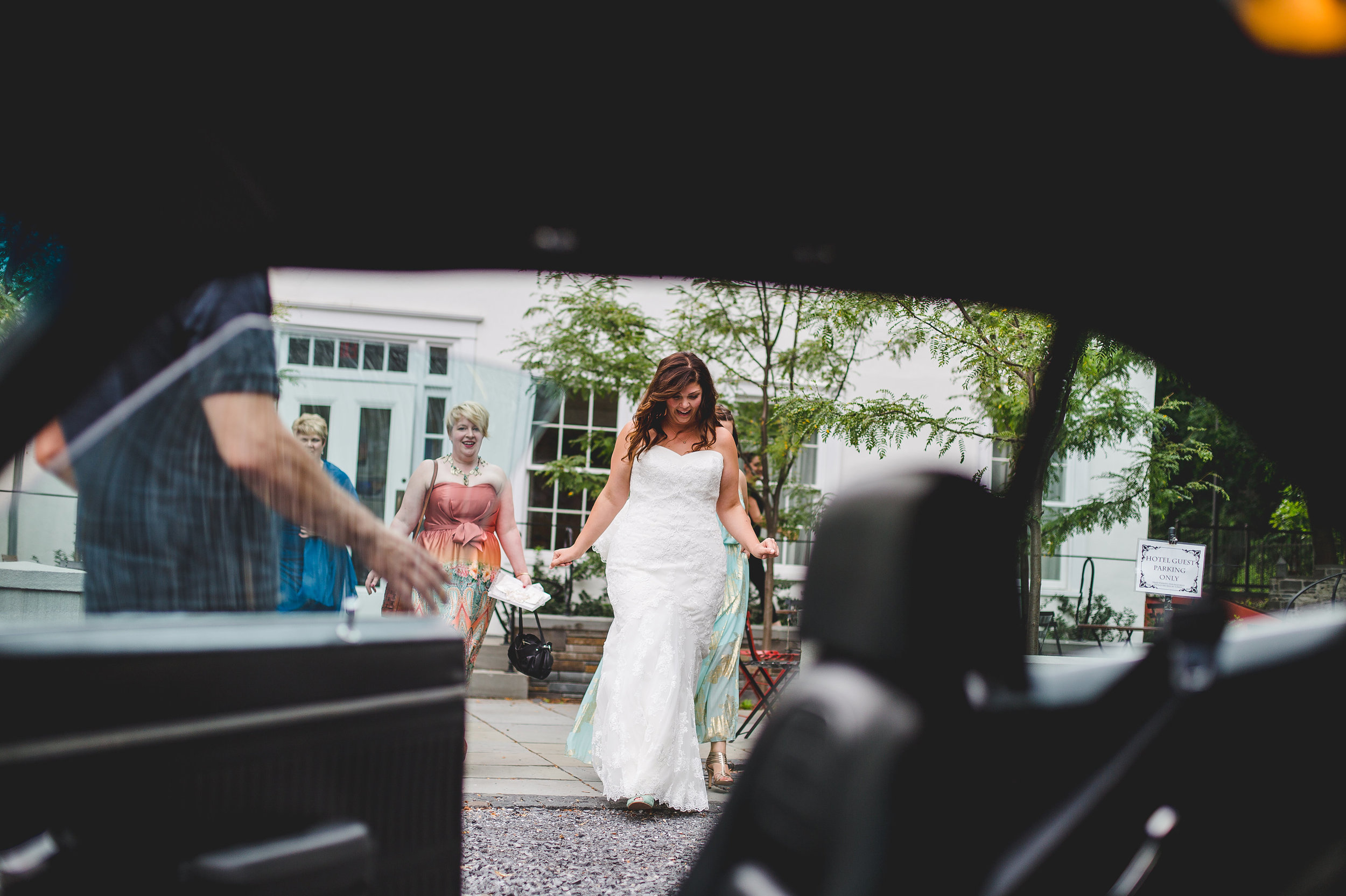 bride-walking-up-to-car-ithaca