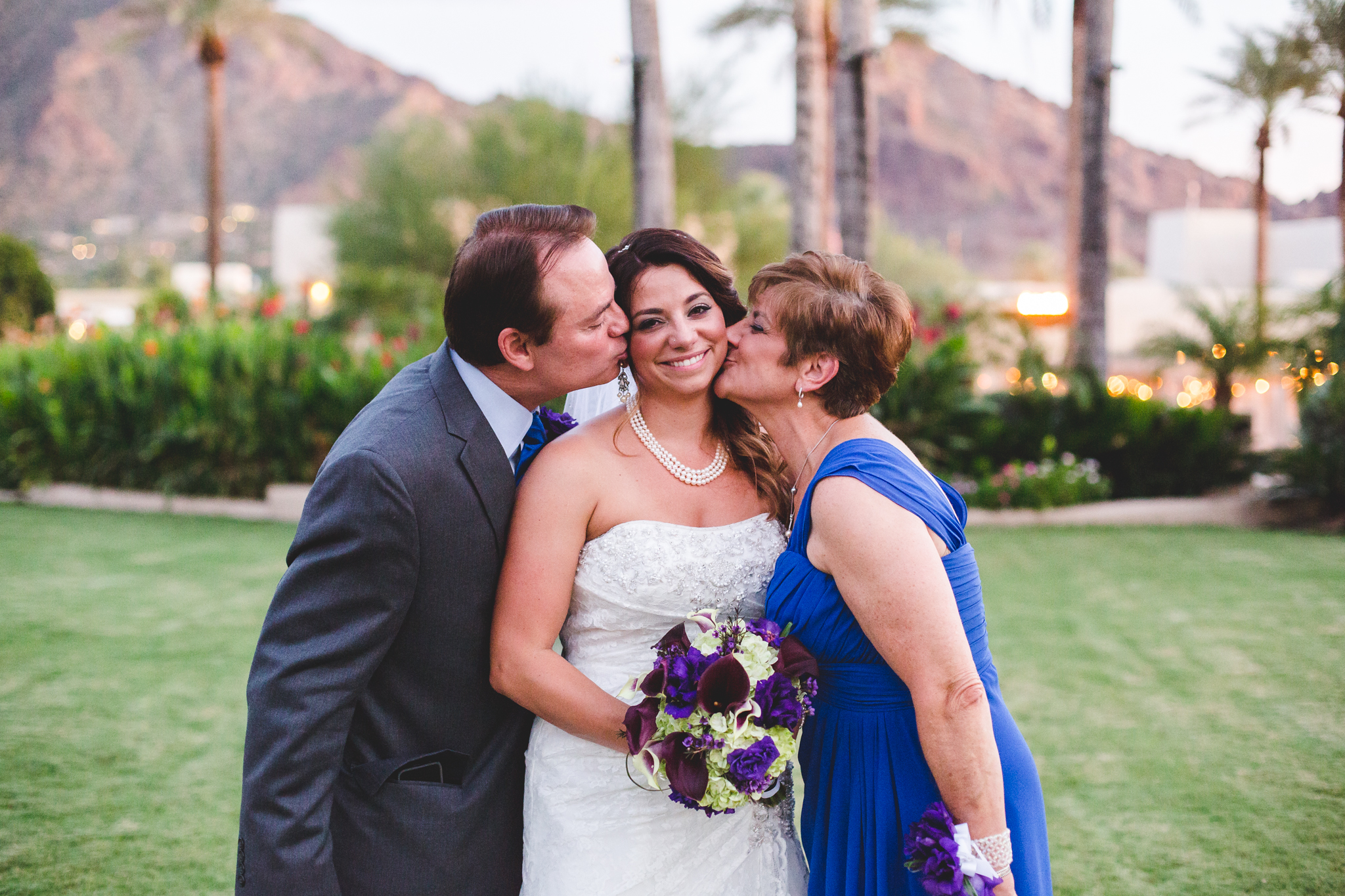 lc wedding parents kissing daughter