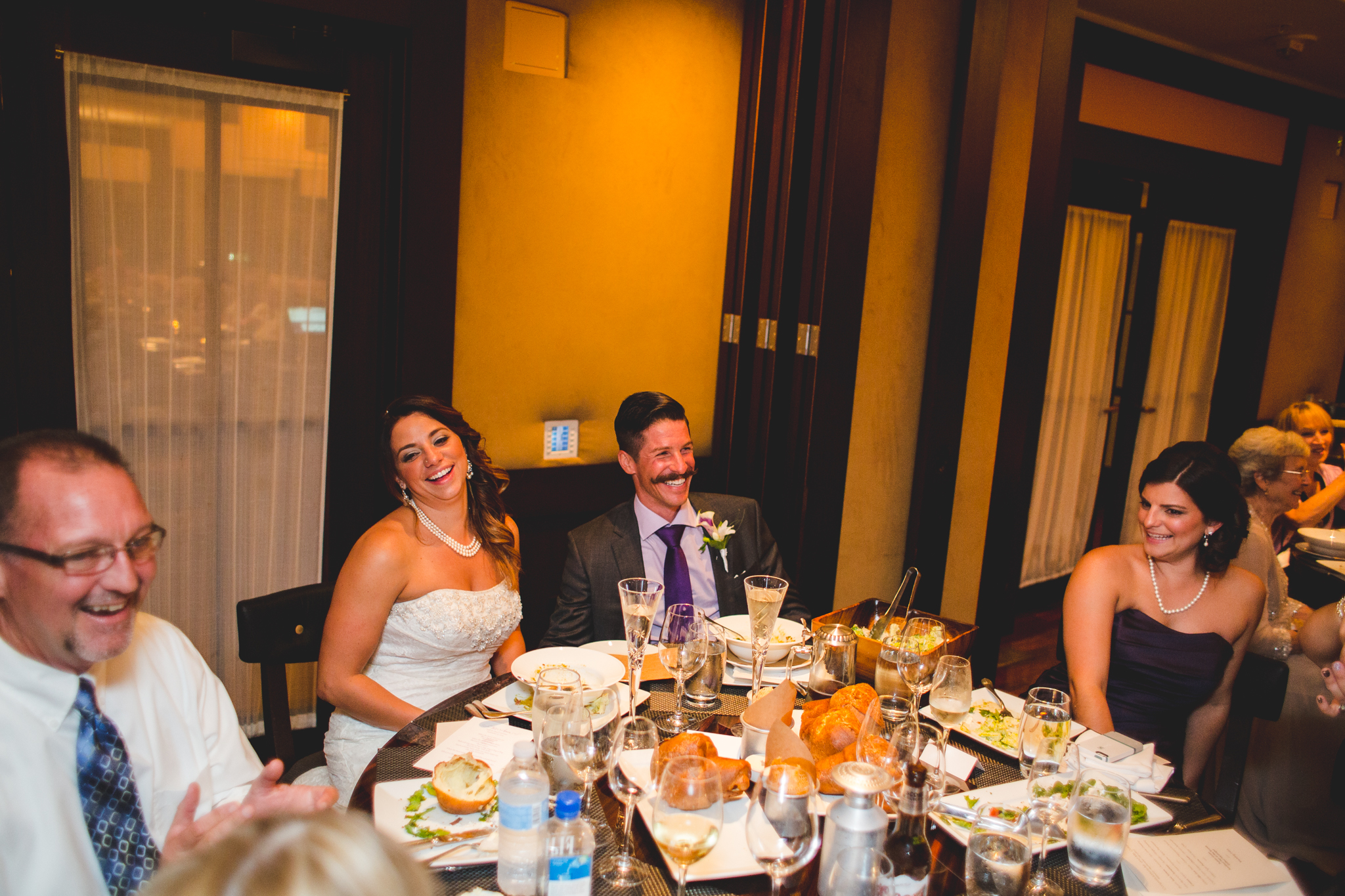 lori bride laughs during reception