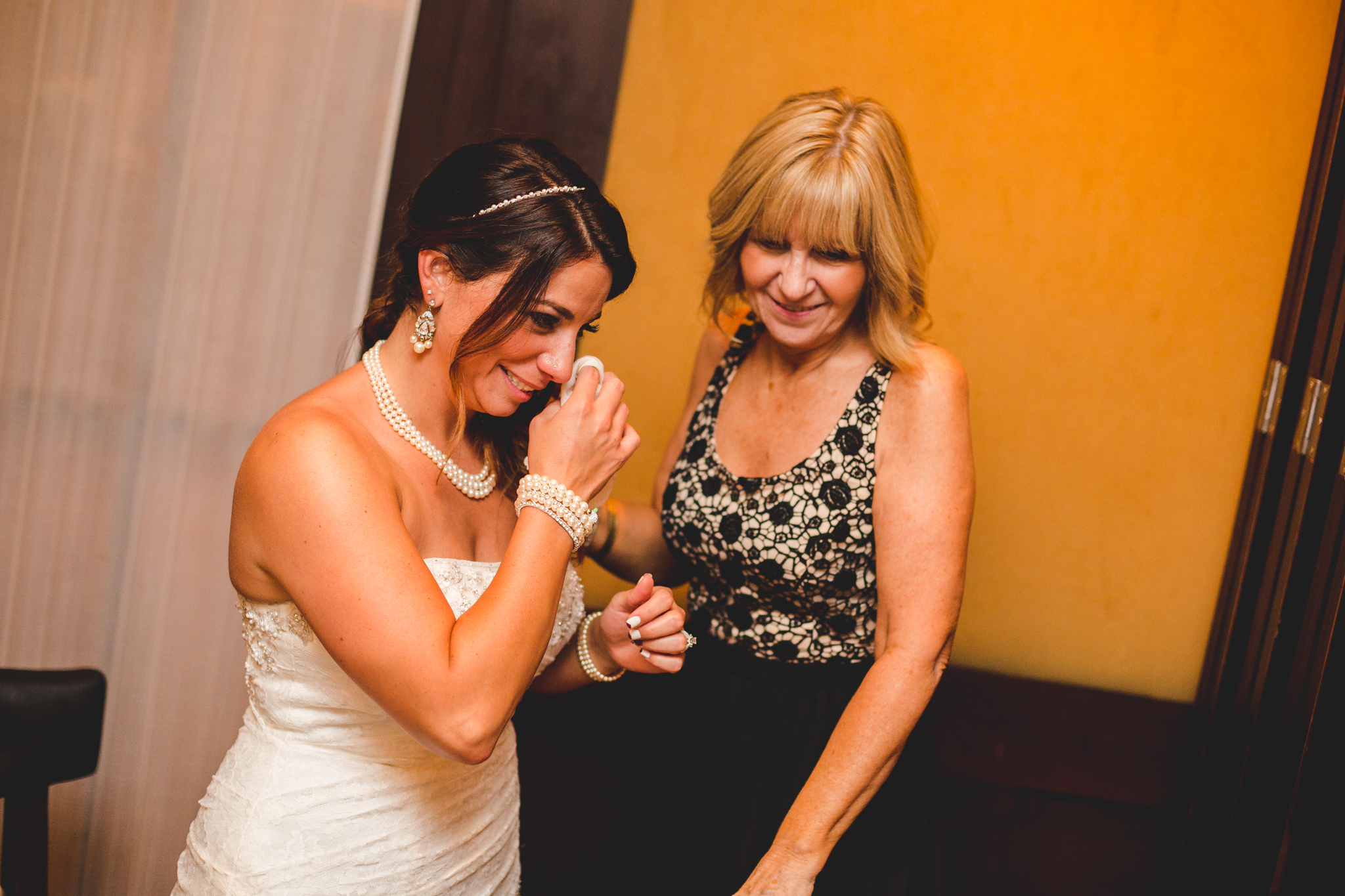 bride and mother of groom share a moment lc