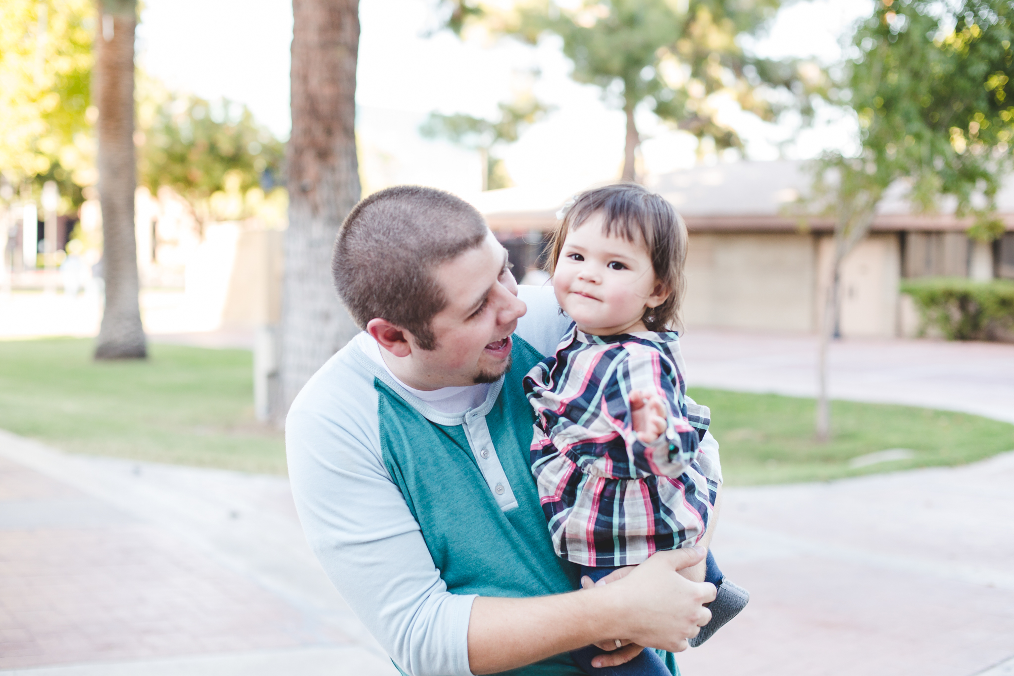 mark gets mae to smile downtown glendale az family photography