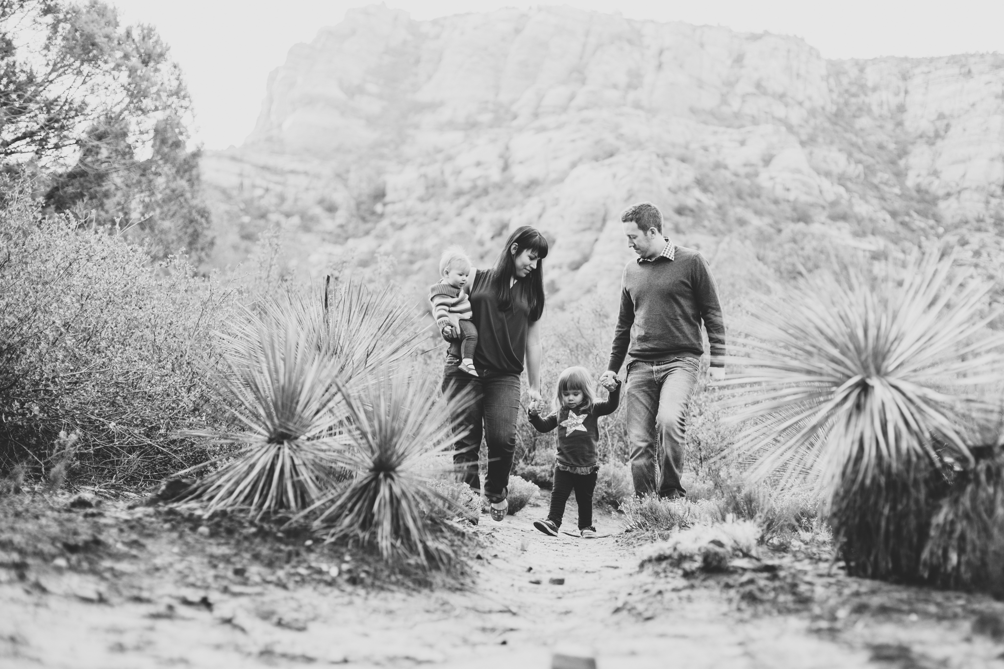 family walking in sedona black and white