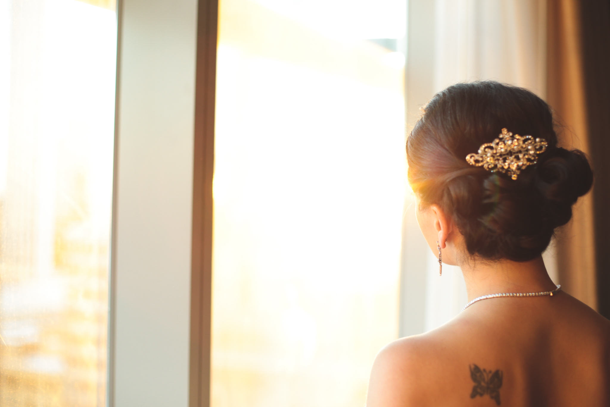 bride in the window at sunset hj