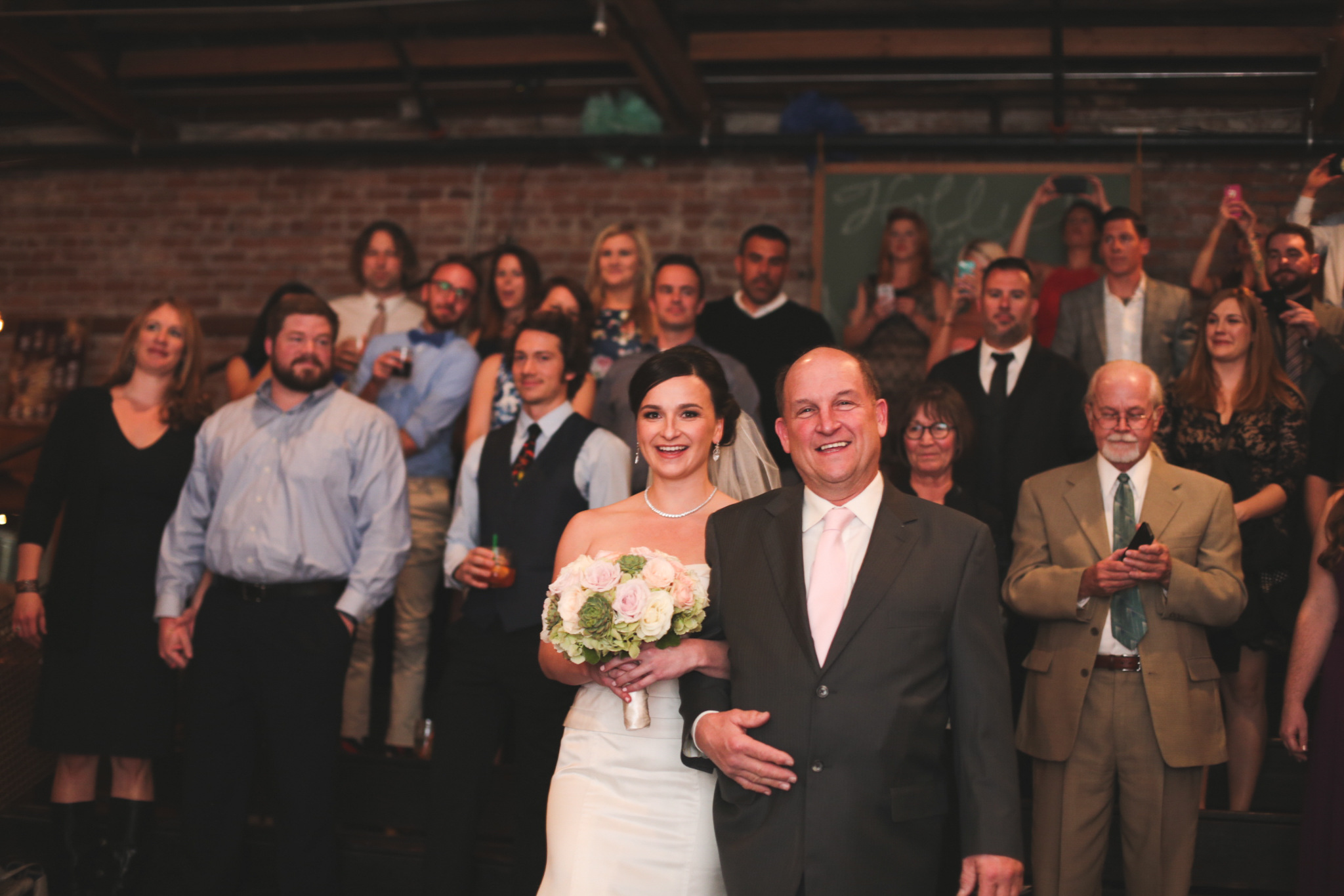 bride comes down aisle with dad hj