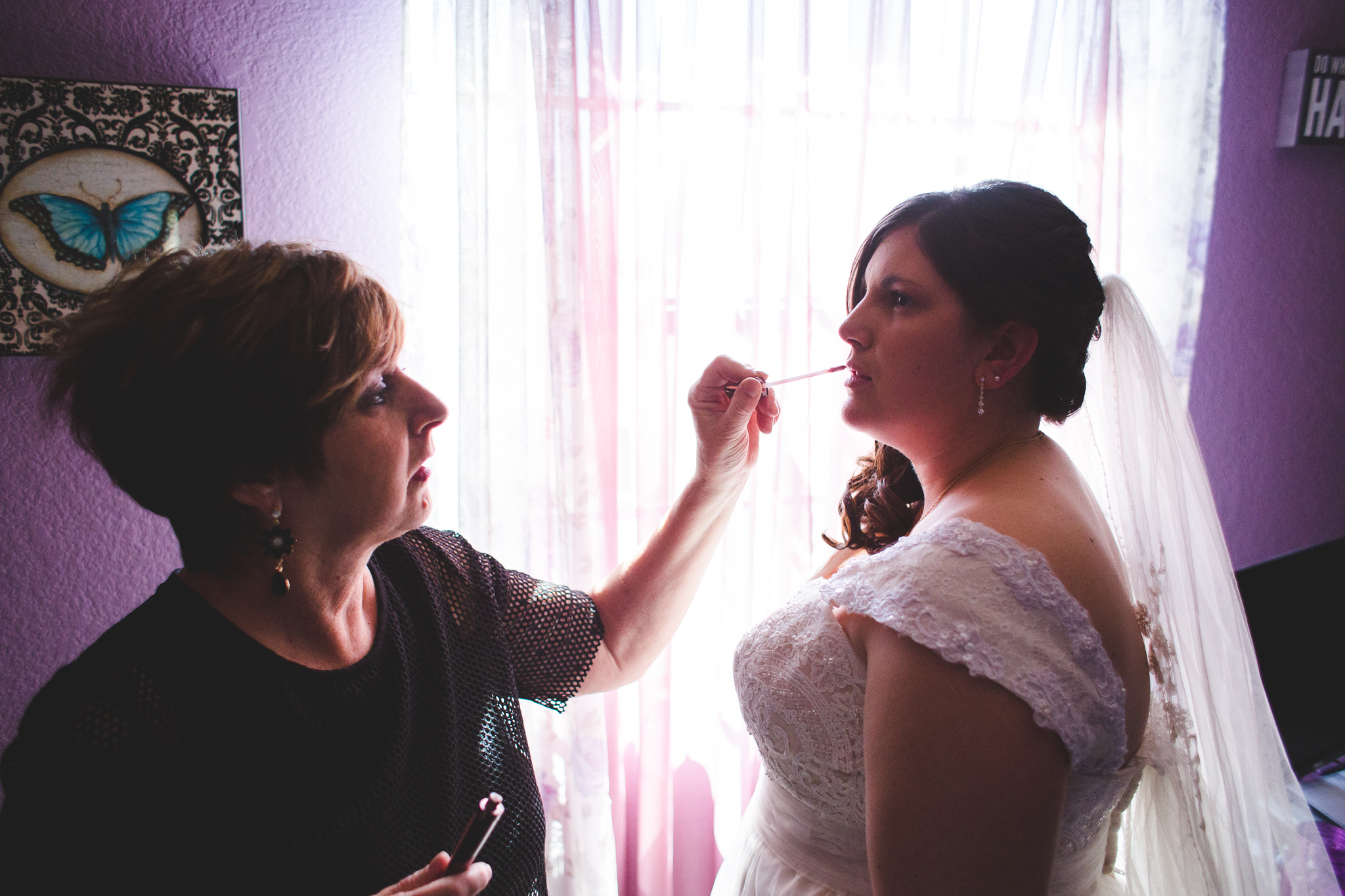bride getting finishing touches put on sd