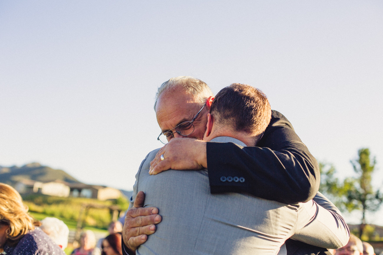 sweet-father-and-groom-hugging