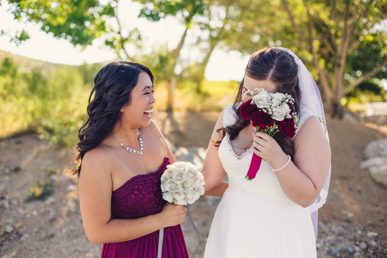 bride-laughing-with-bridesmaid