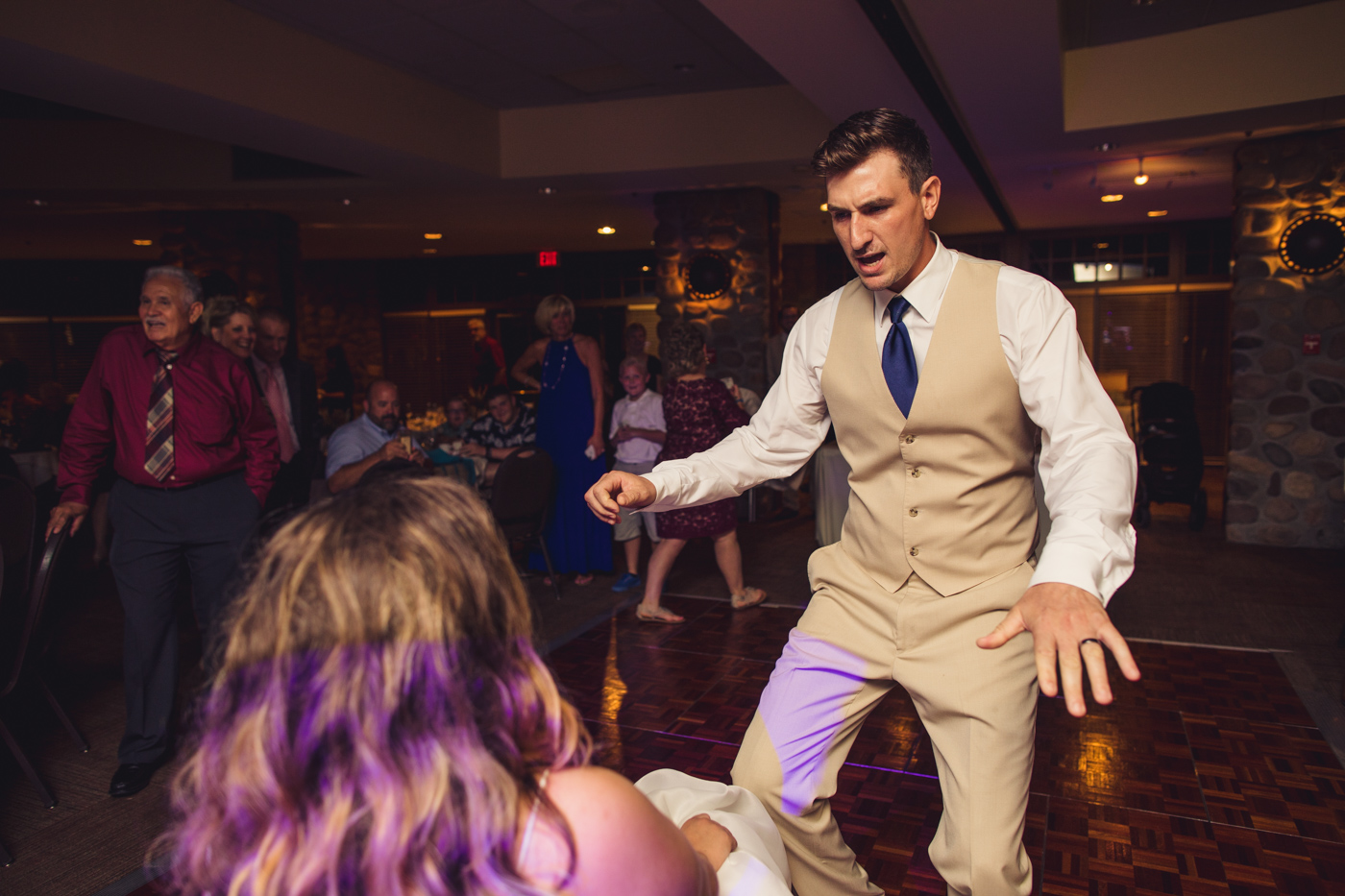 groom-dancing-for-bride