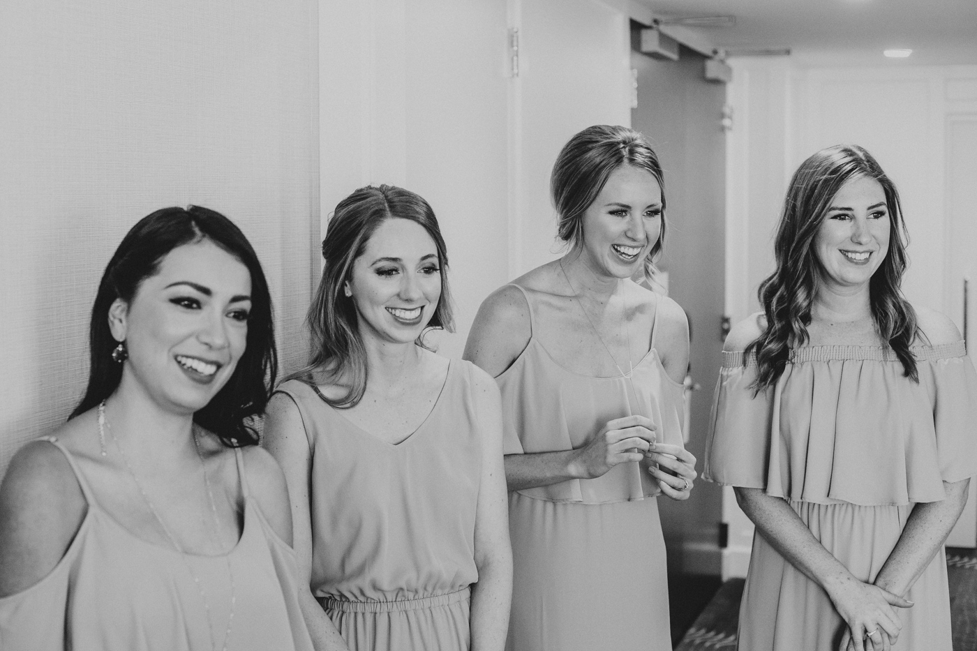 bridesmaids-seeing-bride-all-smiles