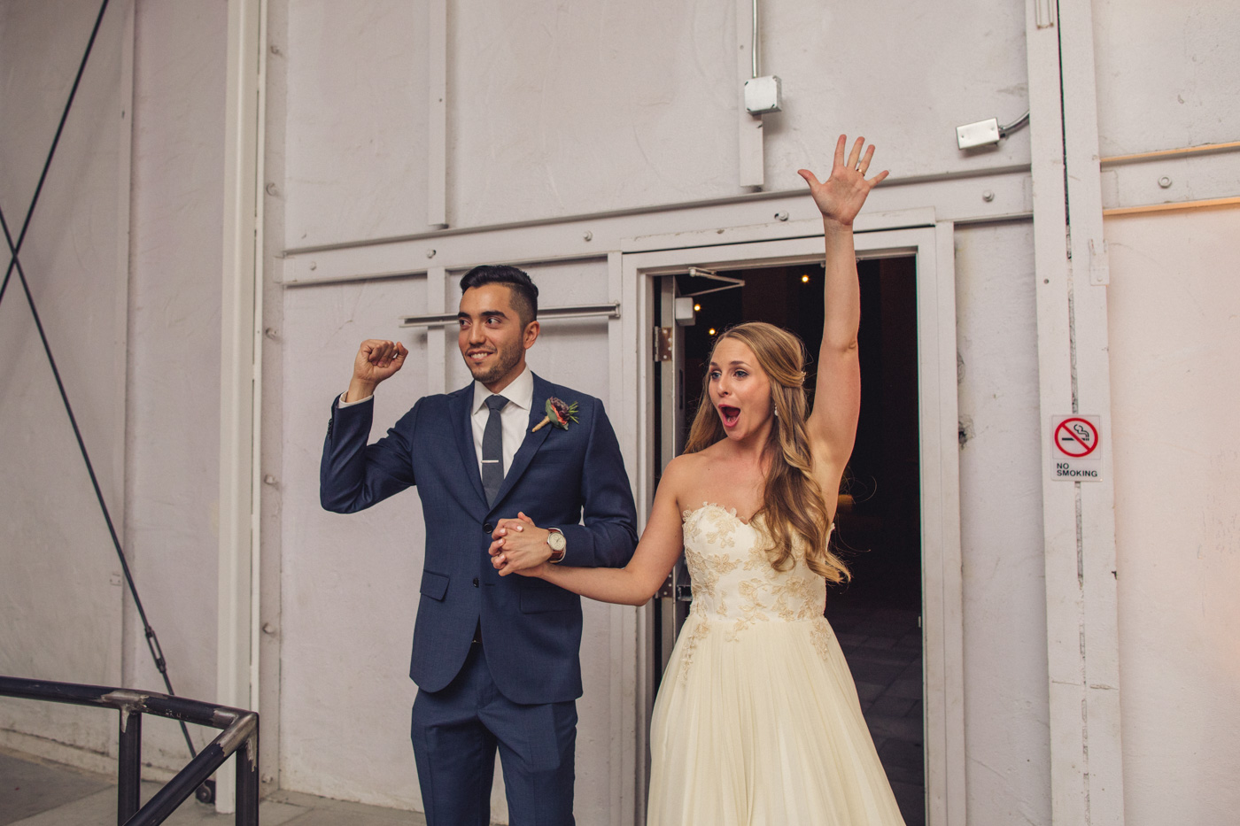bride-and-groom-entering-reception