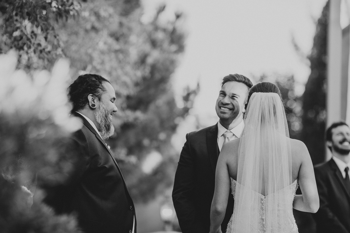 groom-laughing-at-ceremony