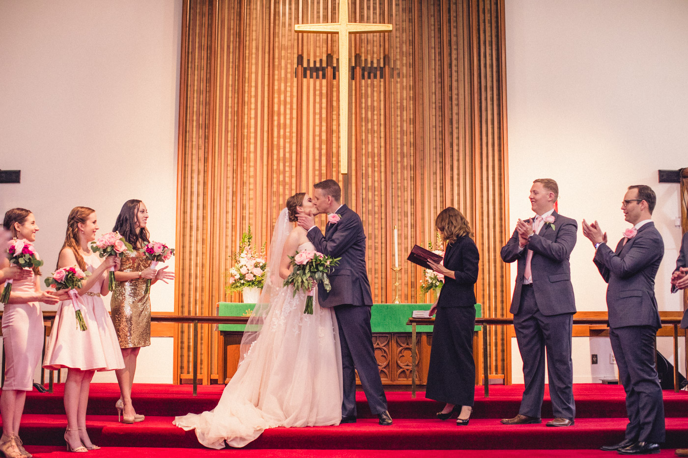 first-kiss-at-wedding-ceremony