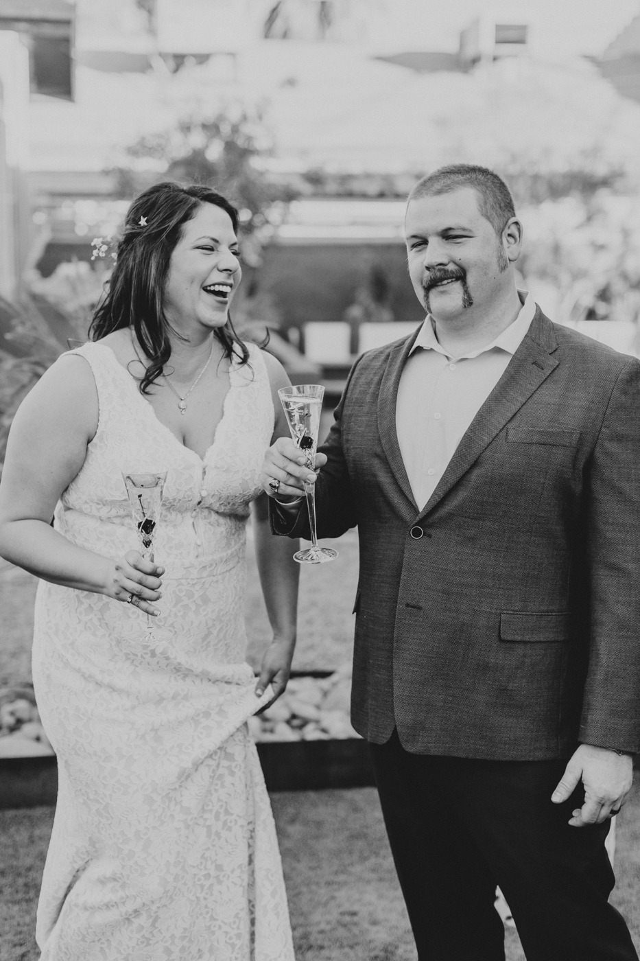 bride-groom-laughing-and-toasting