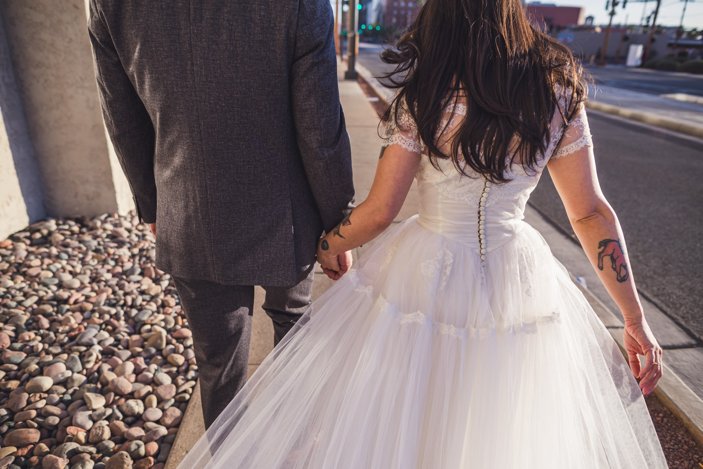 bride-and-groom-hand-in-hand