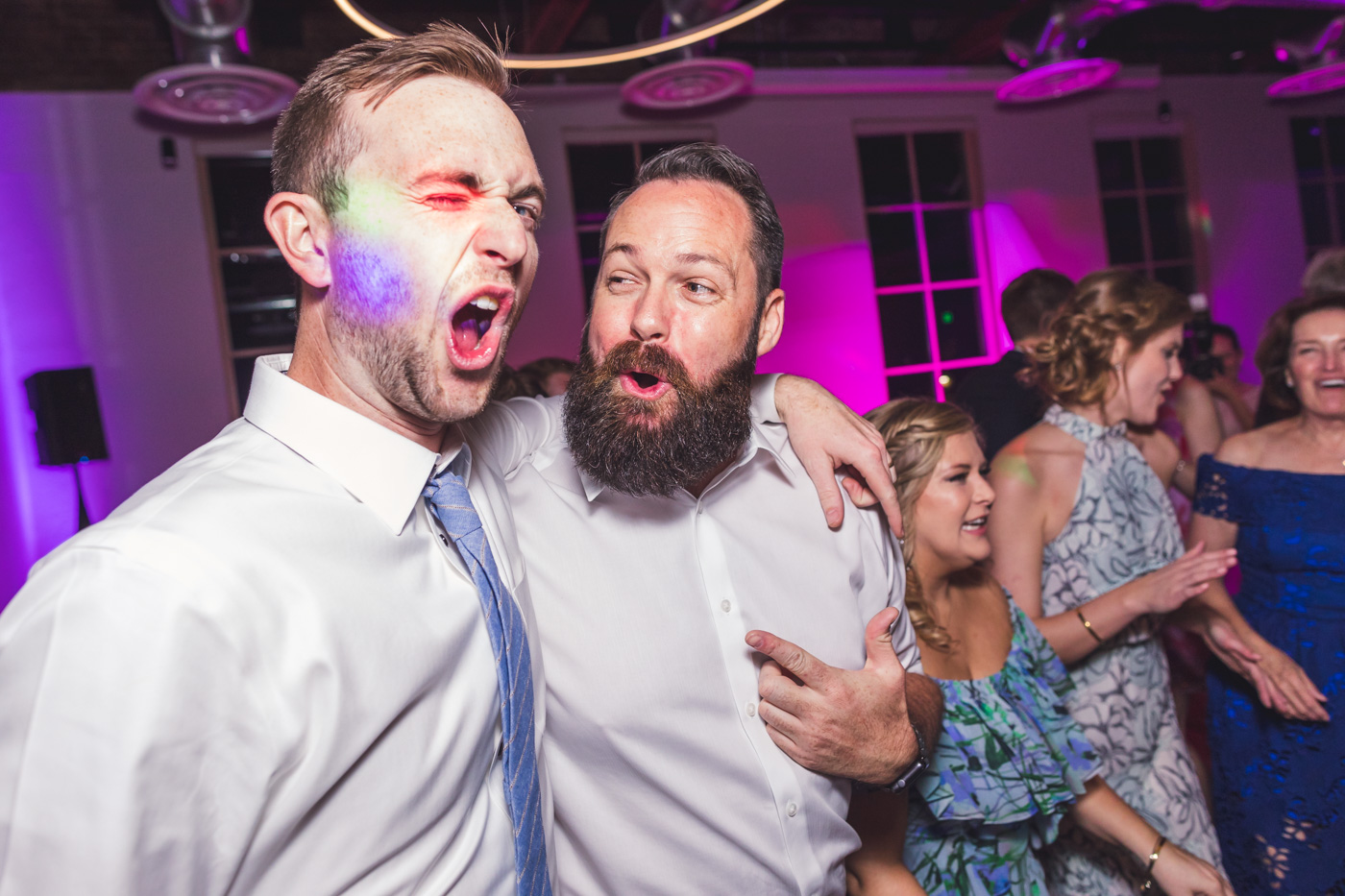 groomsmen-being-silly-at-reception