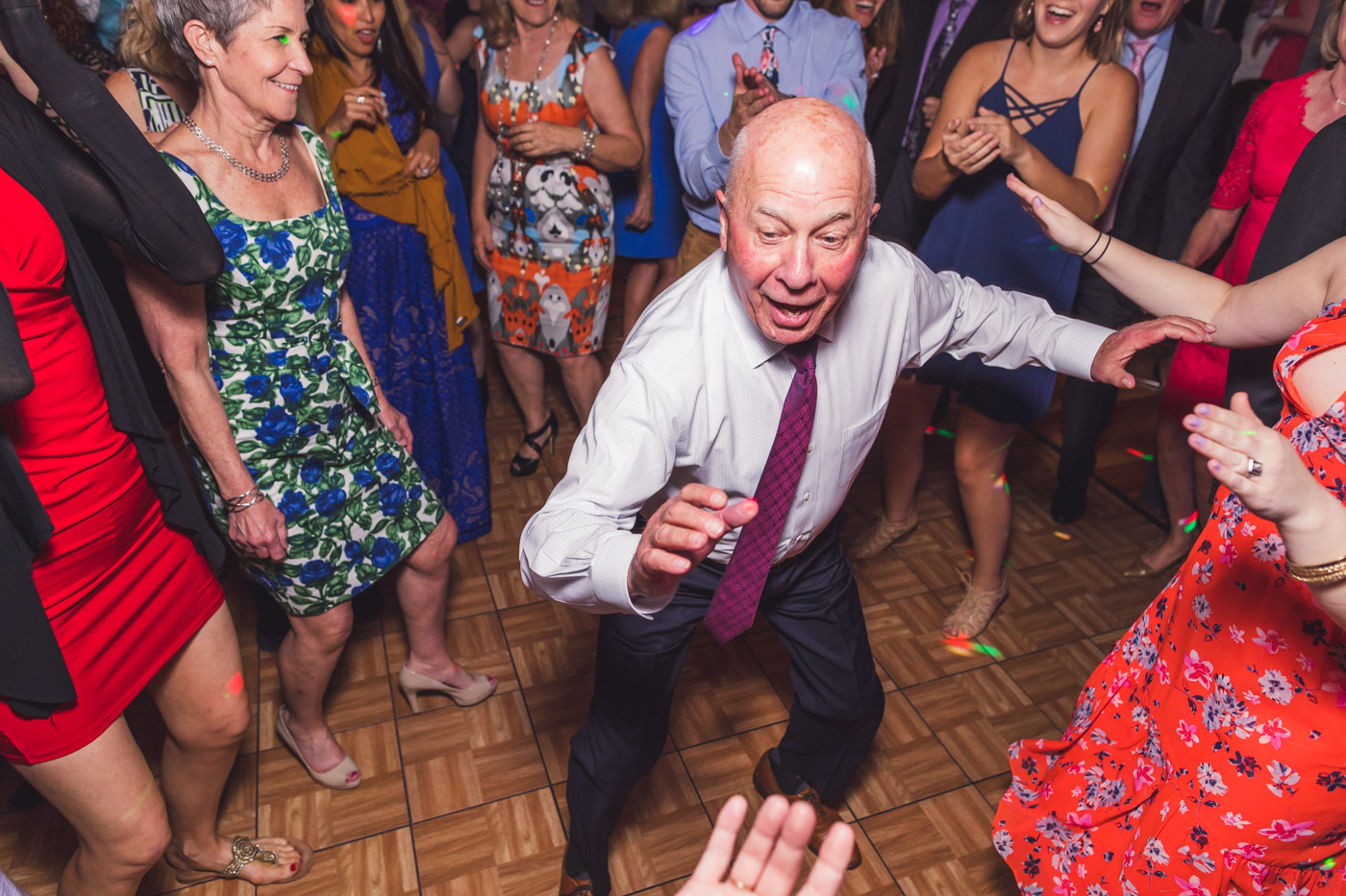 older-wedding-guest-having-fun-dancing