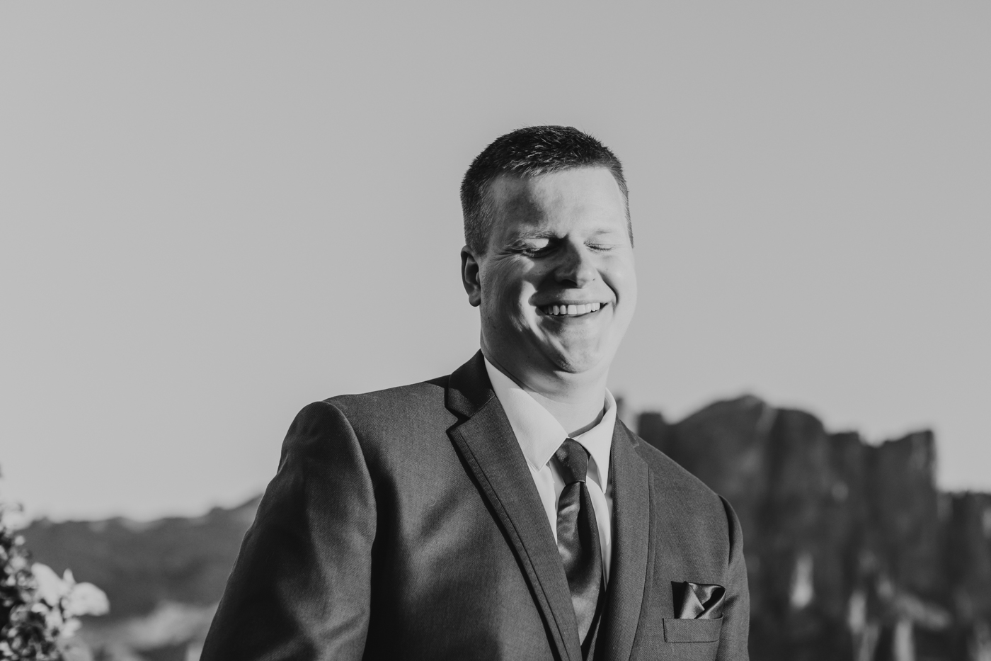 groom-laughing-during-ceremony