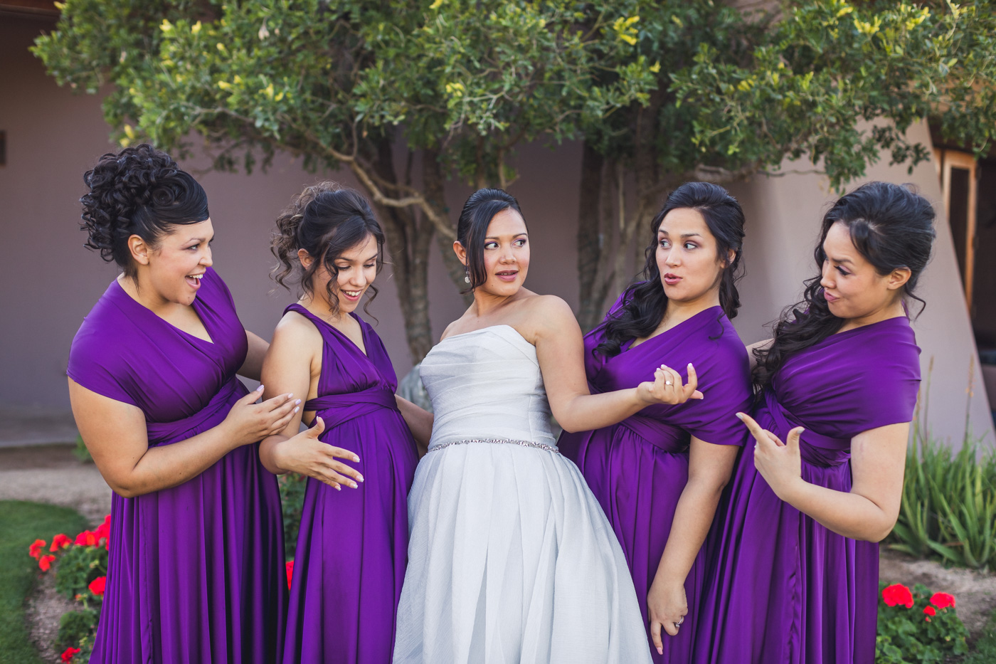 bride-and-bridesmaids-checking-each-other-out