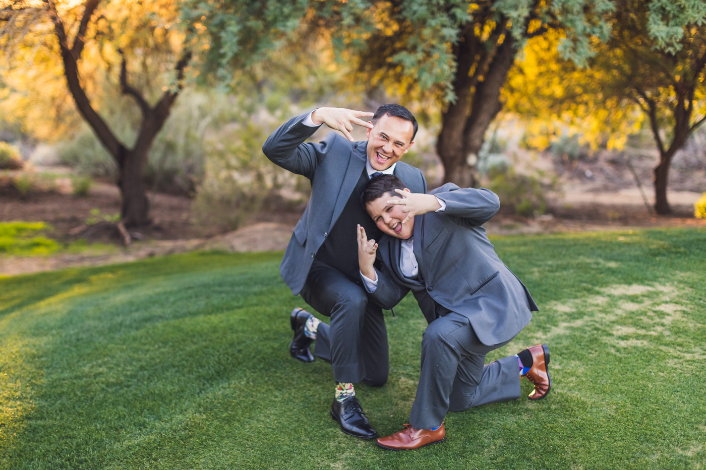 groom-and-son-have-fun-posing