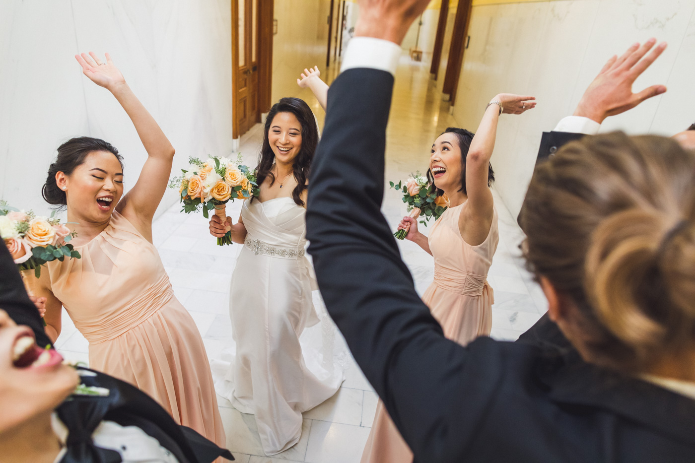 wedding-party-high-fiving