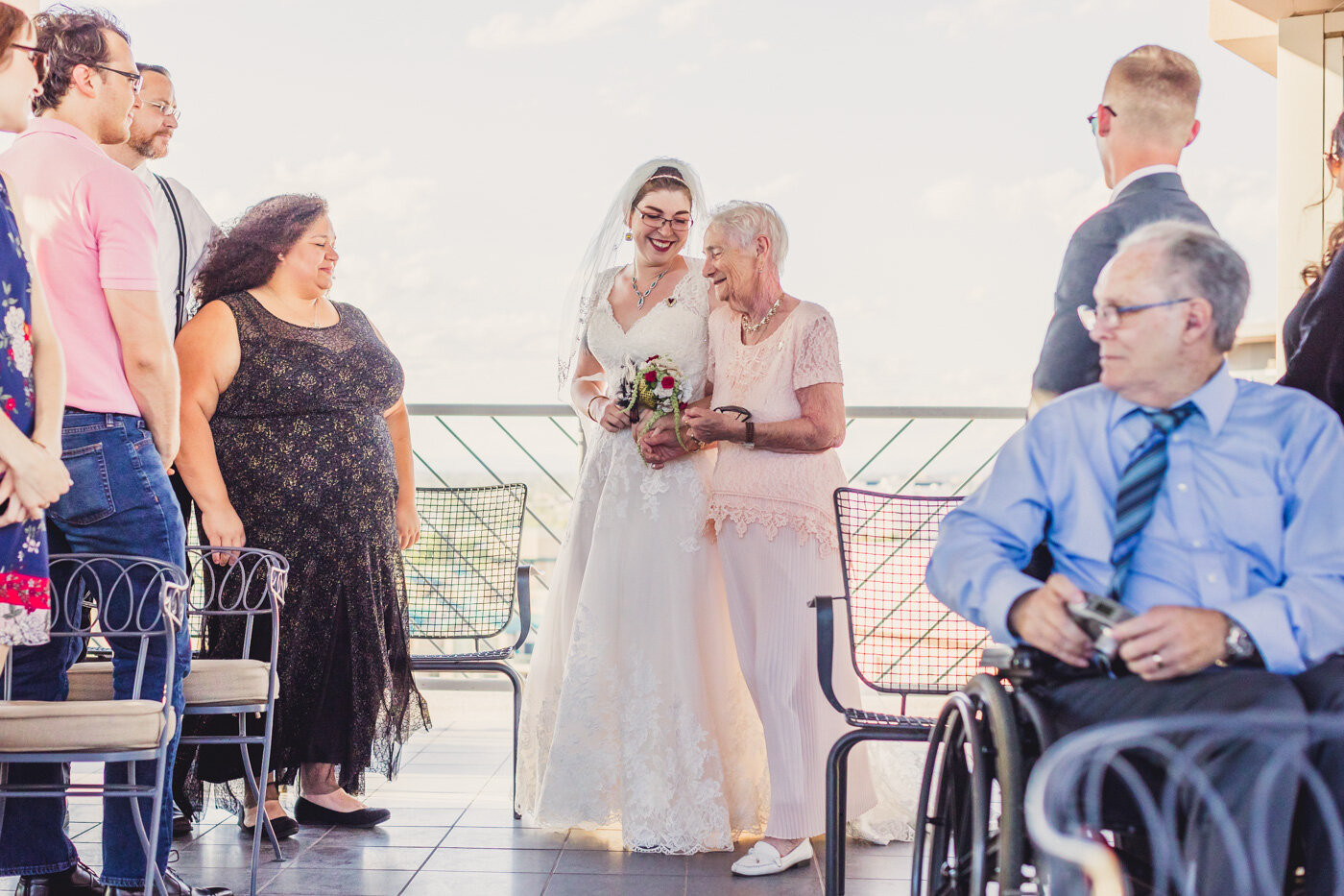 bride-and-grandmother-walk-down-aisle