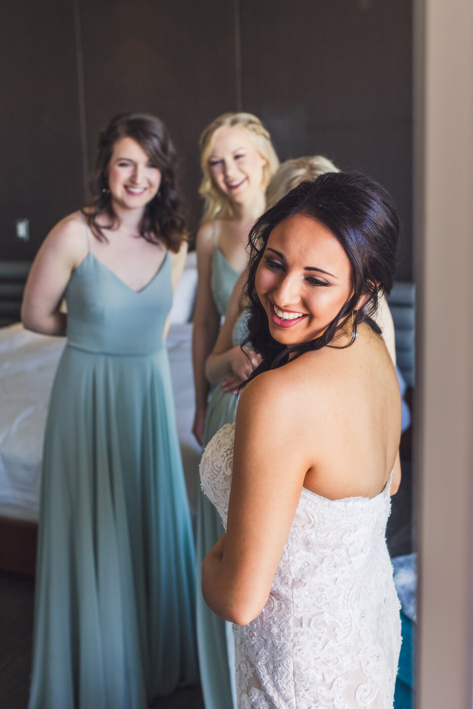 bride-checking-herself-out-in-mirror